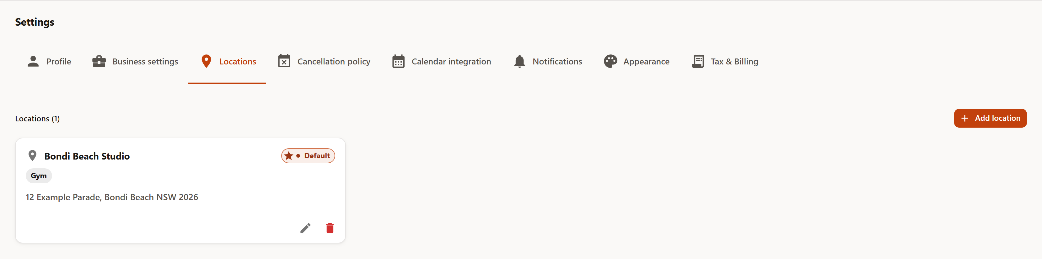 The Locations tab with a card for the location 'Bondi Beach Studio', the 'Default' badge, the Gym type, the address, and the edit and delete icons.